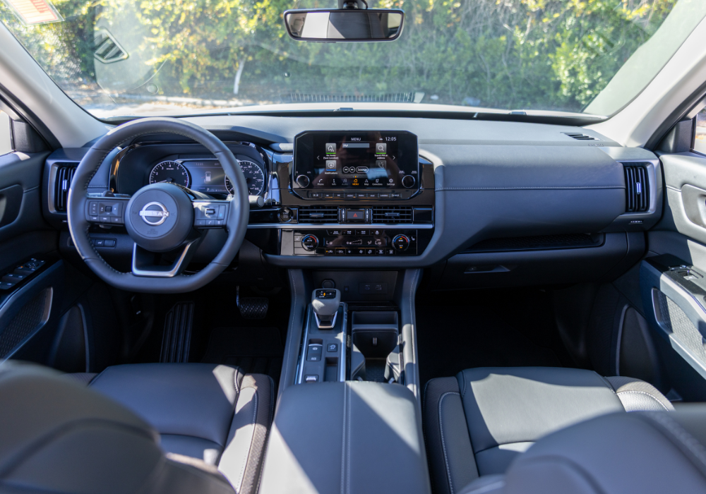 2026 Nissan Pathfinder interior showing three-row seating and infotainment display