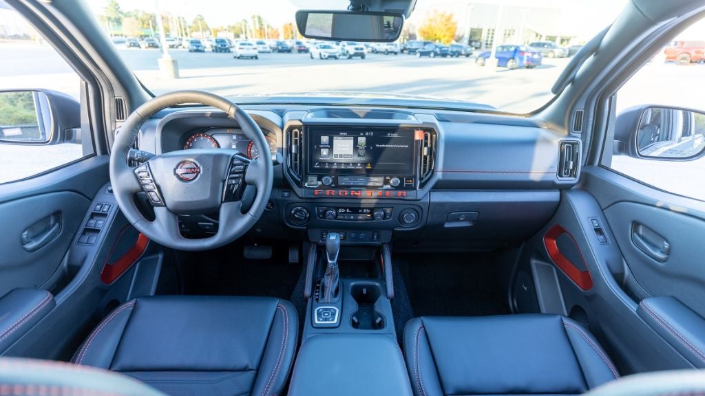 2026 Nissan Frontier interior featuring modern infotainment and comfortable seating