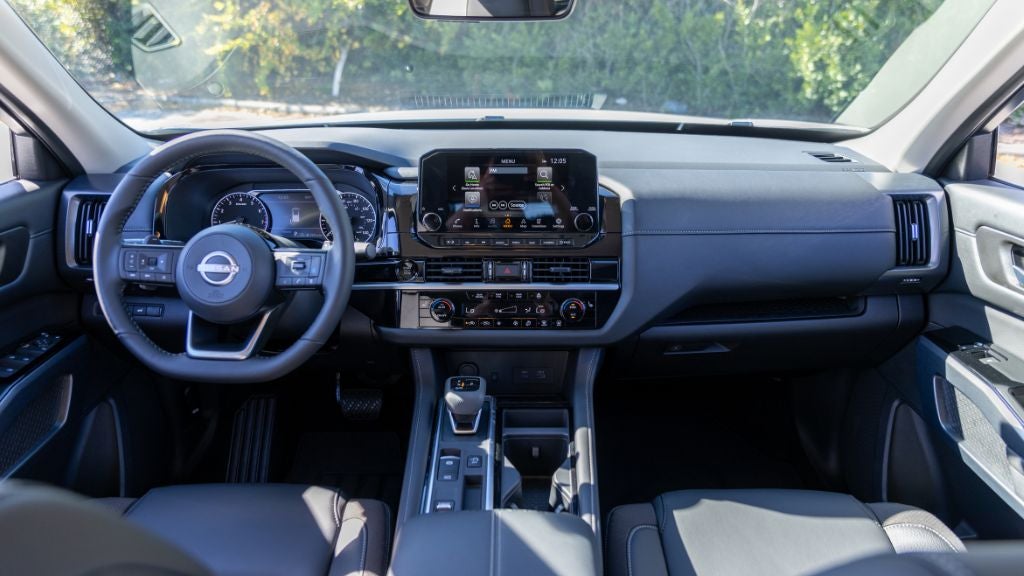 2026 Nissan Pathfinder interior showing three-row seating and infotainment display